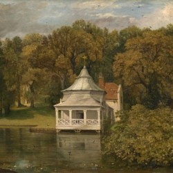 A small white cottage by the river